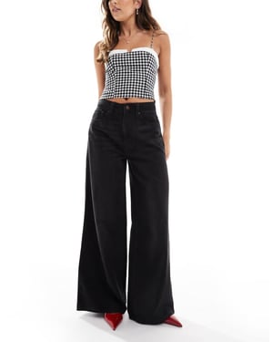 ASOS DESIGN wide leg jean in washed black - BLACK