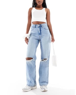 ASOS DESIGN wide leg dad jeans in lightwash with knee rips