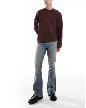 ASOS DESIGN stretch flare jeans i ljusblå tvätt med nyans
