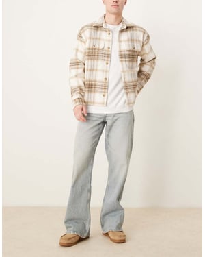 ASOS DESIGN vida flare jeans i urtvättad tvätt
