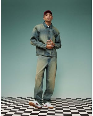 ASOS DESIGN baggy jeans med toning i mellan tvättad blå