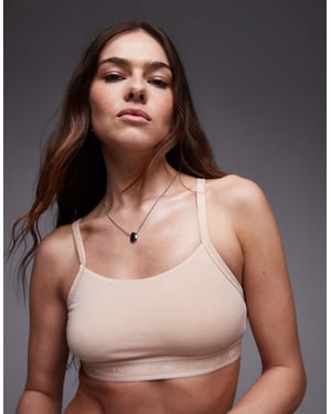 Lacoste co-ord bralette in beige with branded taping