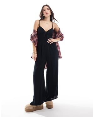 Hollister cami strap jumpsuit with double tie front detail in black
