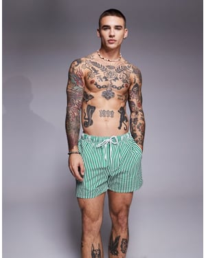 ASOS DESIGN seersucker stripe swim shorts in short length in green