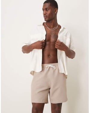 Abercrombie & Fitch 7 inch drawstring swimming trunks in tan