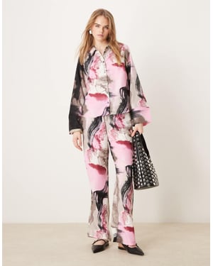 Vila satin vida byxa co-ord i rosa abstrakt mönster