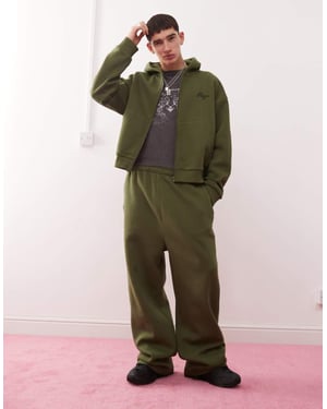 Återvunnen vintage bredbyx-jogger i khaki