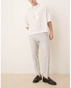 ASOS DESIGN smart tapered fit linen blend trousers in light grey with turnups