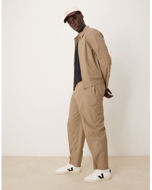 ASOS DESIGN smart co-ord oversized tapered trousers in stone micro check with elasticated waist