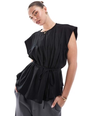 ASOS DESIGN trapeze t-shirt with tie waist in black