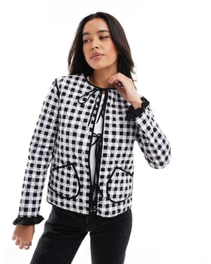 ASOS DESIGN quilted tie front jacket in black gingham