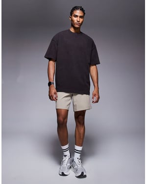 4505 Icon tungviktig bomulls oversized t-shirt med snabbtorkande finish i tvättad brun