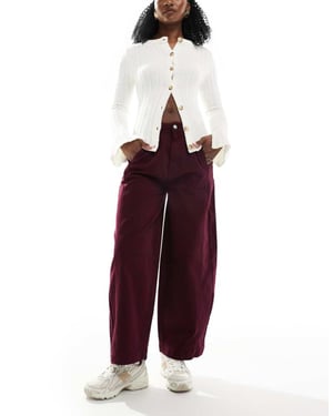 ASOS DESIGN seamed barrel trousers in dark cherry