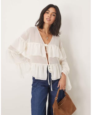 ASOS DESIGN chiffon boho ruffle blouse in cream