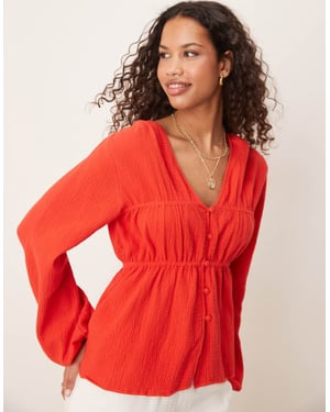 ASOS DESIGN long sleeve smock top with button front in red