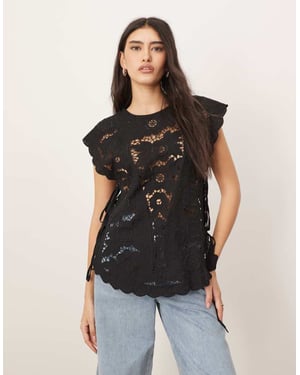 ARRANGE cotton cutwork embroidered top with tie side in black