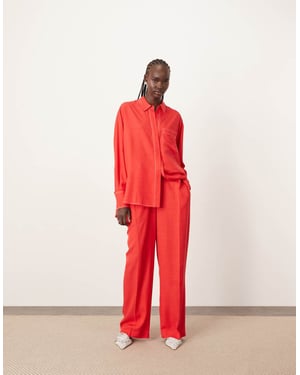 ARRANGE wide leg trouser with contrast stitch co-ord in red