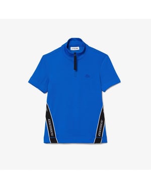 Women's Lacoste Ribbed Collar Zip Neck Short Sleeve Polo Shirt in Marina