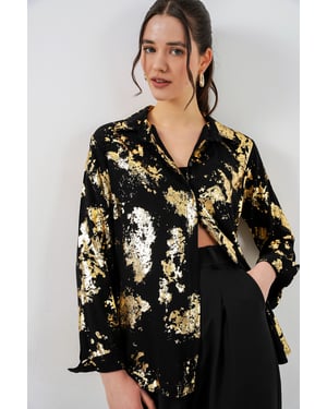 Oversized gestreepte blouse met knopen