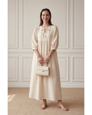 Maxi-jurk met strikdetail en losse pasvorm