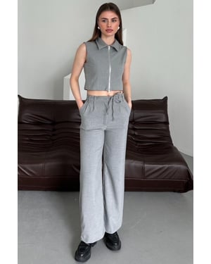 Mouwloze Vest met Rits & Wijde Pantalon Twee-Delige Set