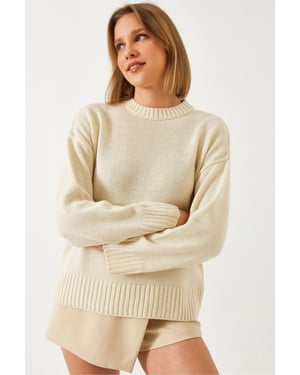 Avslappnad passform crewneck ribbstickad tröja