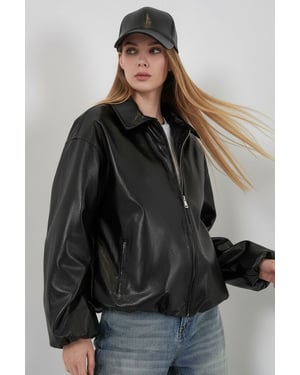 Oversized konstläder zipjacka