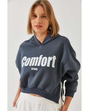 Gebreid oversized crop sweatshirt met capuchon en pompon