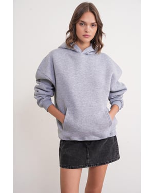Oversized huvtröja med ficka