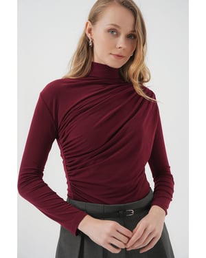 Aansluitende colblouse met drapeer-detail