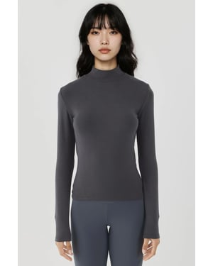 Ultrasoft Turtleneck Gebreide Top met Slim Fit
