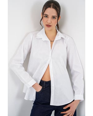 Oversized gestreepte blouse met knopen