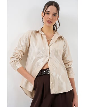Oversized gestreepte blouse met knopen