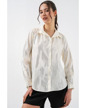 Oversized gestreepte blouse met knopen