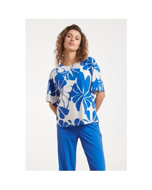 Smashed Lemon Blauw-witte travel top met grafische bloemenprint |