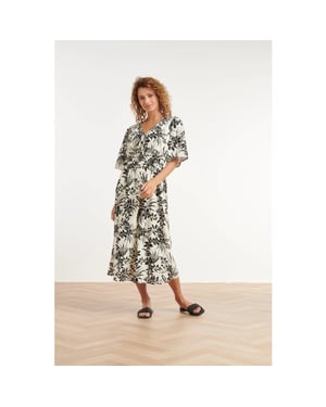 Smashed Lemon Zwart-witte jurk met tropische print en strikdetail |