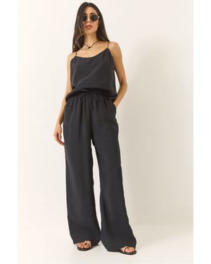 Mouwloze Camisole en Wijde Broeken Coördinatie Set