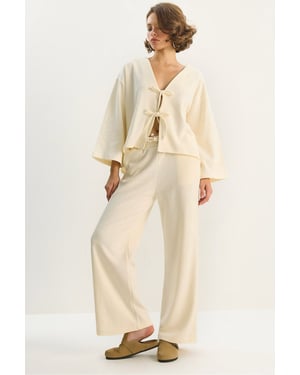 V-hals Gebreide Cardigan en Wijde Pantalon Set