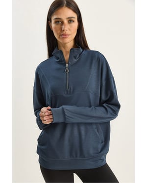 Avslappnad passform med dragkedja och krage, stickad sweatshirt