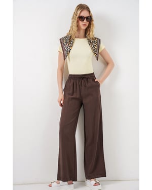 Hoge taille wijde broek met zakken