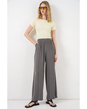Brede Pijpen Broek met Elastische Taille