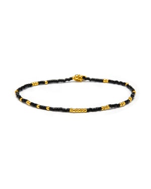 Luxenter Armband van zwart glas met 18k geelgouden afwerking - Xanvi