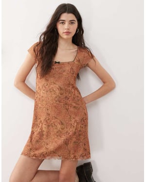 Reclaimed Vintage babydoll mesh mini dress with bow detail in paisley print - MULTI