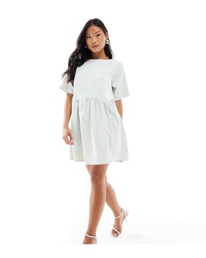 ASOS DESIGN petite smock t-shirt i kord med midjesöm i mintgrön