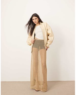 ARRANGE metallic knitted sheer sweeping maxi skirt in gold