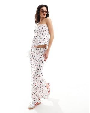 ASOS DESIGN broderad kolumnkjol med band i körsbärstryck