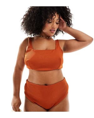 ASOS DESIGN Curve Emily ribbad högbenskjol med hög midja i rostfärg