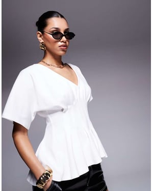 ASOS DESIGN interlock V neck tshirt with pleated waist in cream