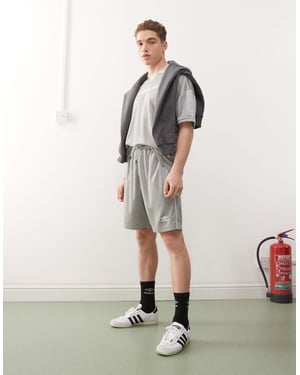 Umbro football shorts in silver