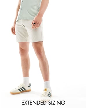 ASOS DESIGN 2-pack slim stretch chinoshorts i khaki och sten spara